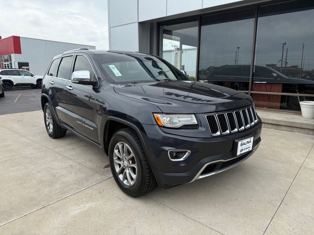 2014 Jeep Grand Cherokee Limited in Maximum Steel Metallic Clearcoat — front three-quarter view