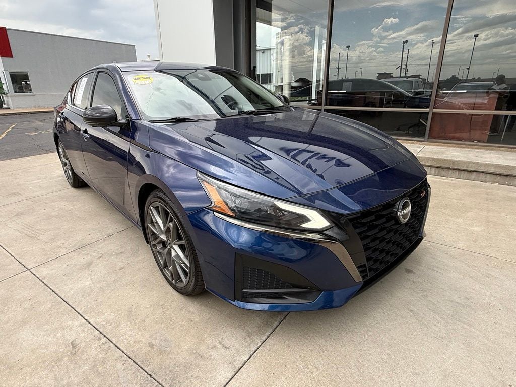 2023 Nissan Altima 2.0 SR in Deep Blue Pearl — front three-quarter view
