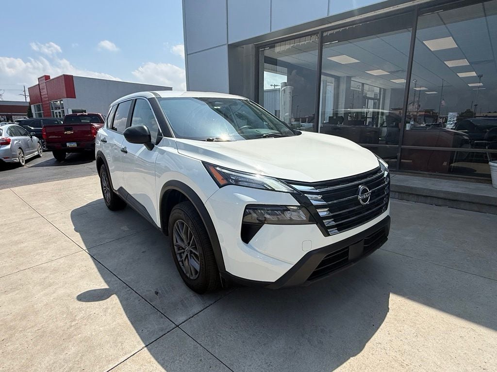 2024 Nissan Rogue S in Glacier White — front three-quarter view