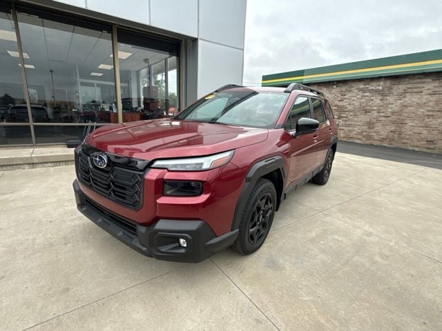 2026 Subaru OUTBACK Limited in Crimson Red Pearl — front three-quarter view