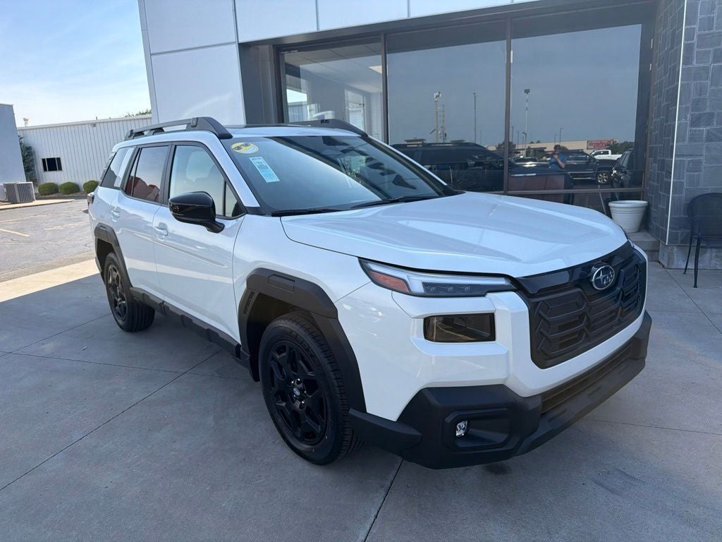 2026 Subaru OUTBACK Limited in Crystal White Pearl — front three-quarter view