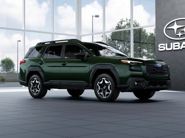 2026 Subaru OUTBACK Touring in Deep Emerald Green Pearl — front three-quarter view